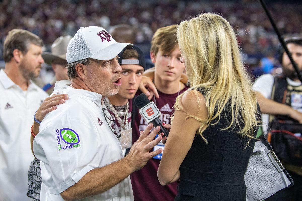 Head Coach Jimbo Fisher speaks with an ESPN correspondent after the Aggies defeated Arkansas 23-21 at the Southwest Classic on Saturday, Sept. 24, 2022, at AT&T Stadium in Arlington, Texas.