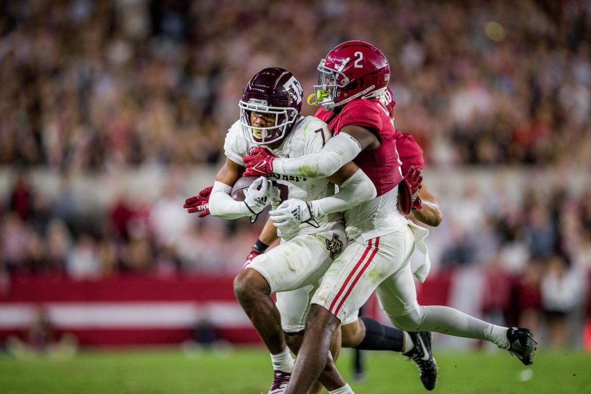 Sophomore WR Moose Muhammad III (7) runs with the ball during a game against the Alabama Crimson Tide on Saturday, Oct. 8, 2022, at Bryant-Denny Stadium in Tuscaloosa, Alabama.