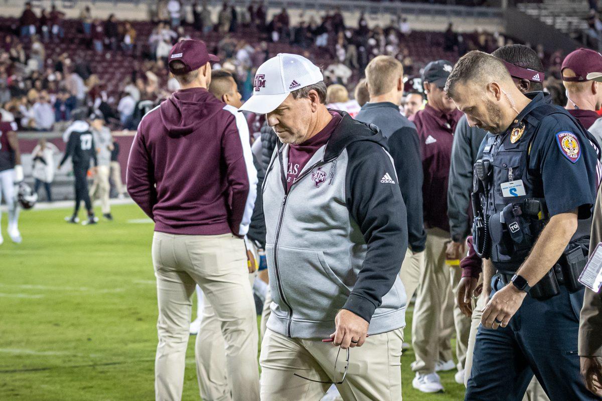 Coach Jimbo Fisher walks back to the locker room after Texas A&Ms game against Ole Miss at Kyle Field on Saturday, Oct. 29, 2022.