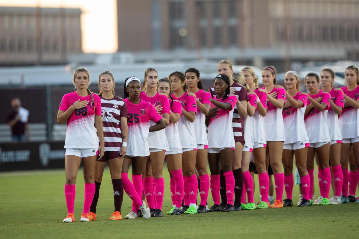 The Aggies pledge allegiance to the United States flag before Texas A&amp;M's match against Rice at Ellis Field on Sunday, Oct. 2, 2022.