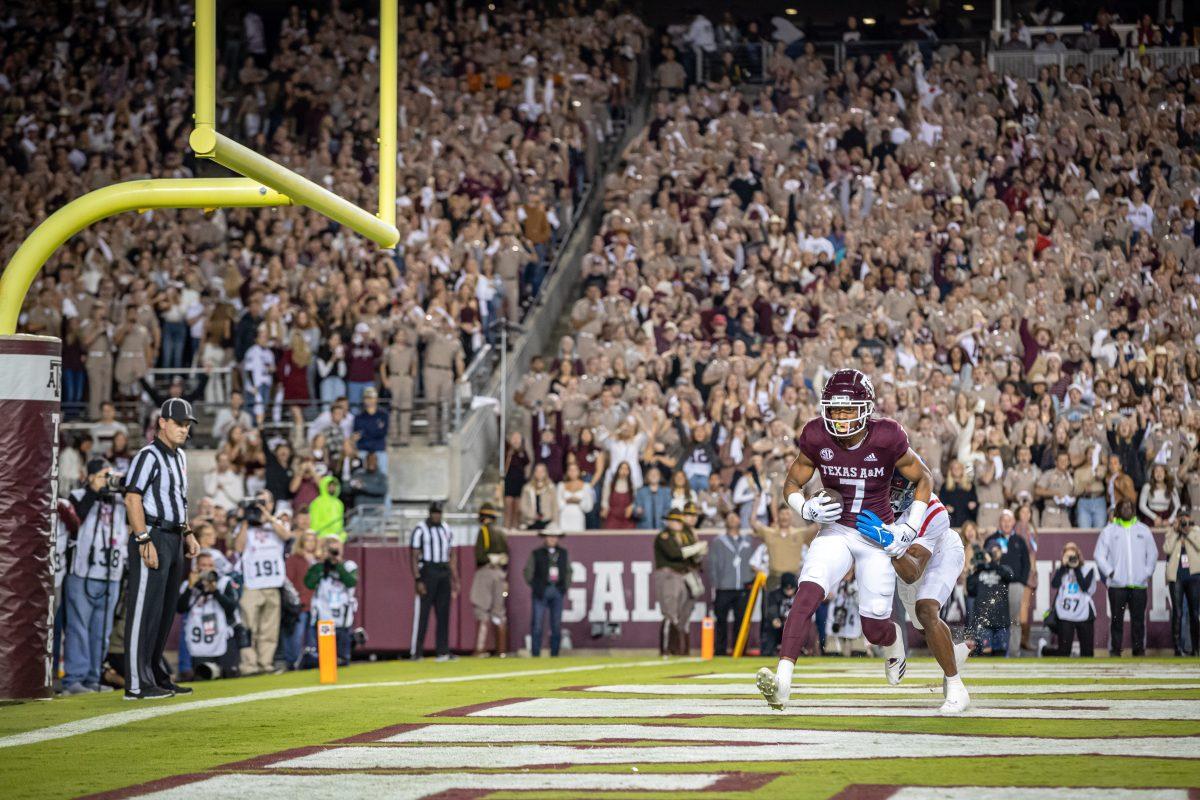 Sophomore WR Moose Muhammad III (7) completes a pass from freshman QB Conner Weigman (15) during Texas A&Ms game against Ole Miss at Kyle Field on Saturday, Oct. 29, 2022.