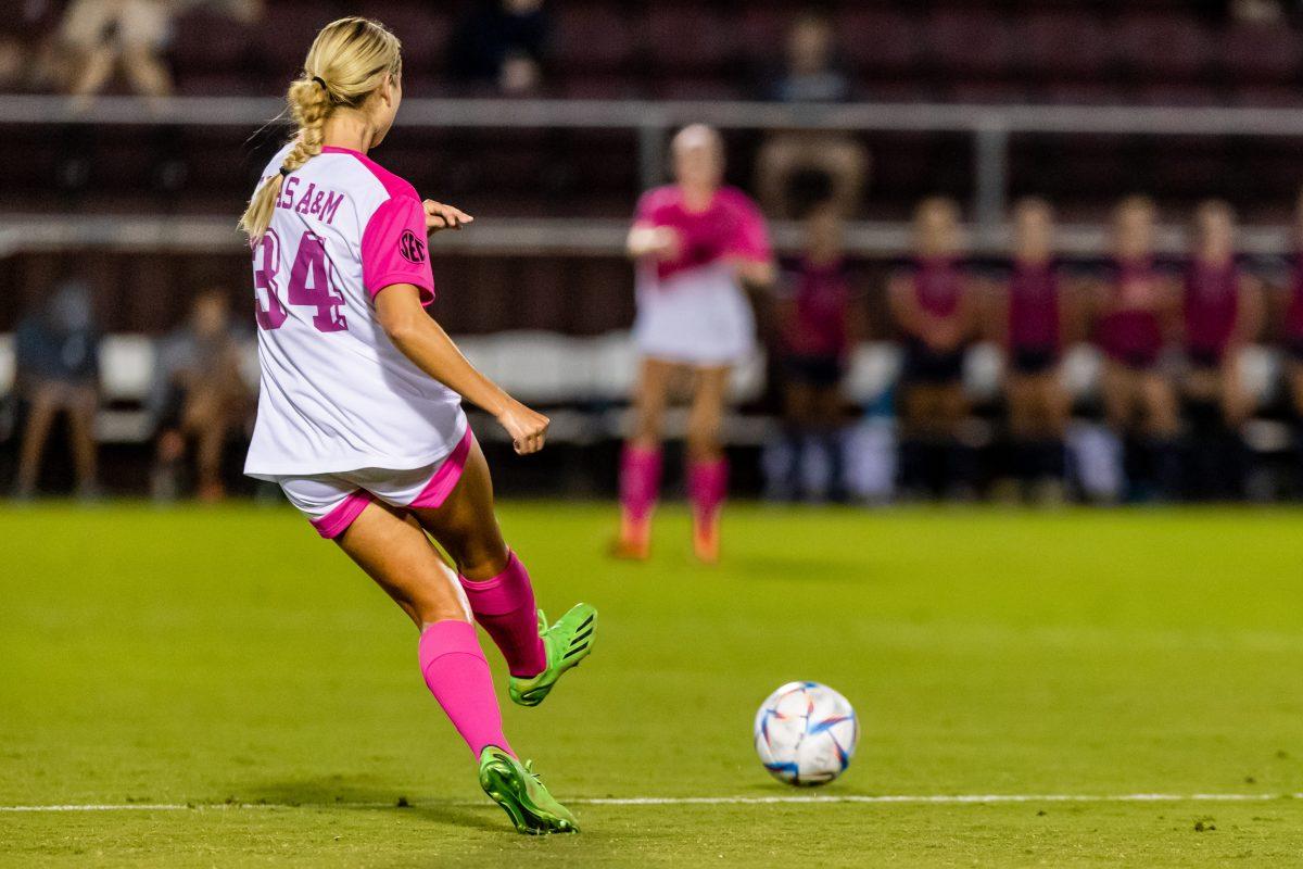 Sophomore MF Quinn Cornog (34) passes the ball during Texas A&Ms match against Rice at Ellis Field on Sunday, Oct. 2, 2022.