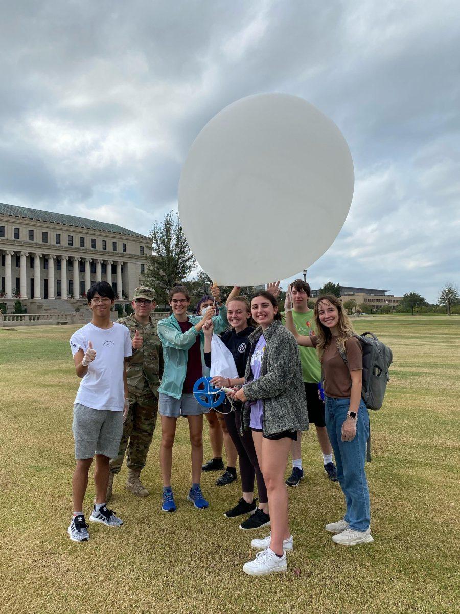 Students from Texas A&M’s Student Operational Upper-Air Program, or SOUP, prepare to launch a weather balloon outside the Jack K. Williams Administration Building on Monday, Oct. 24, 2022.
