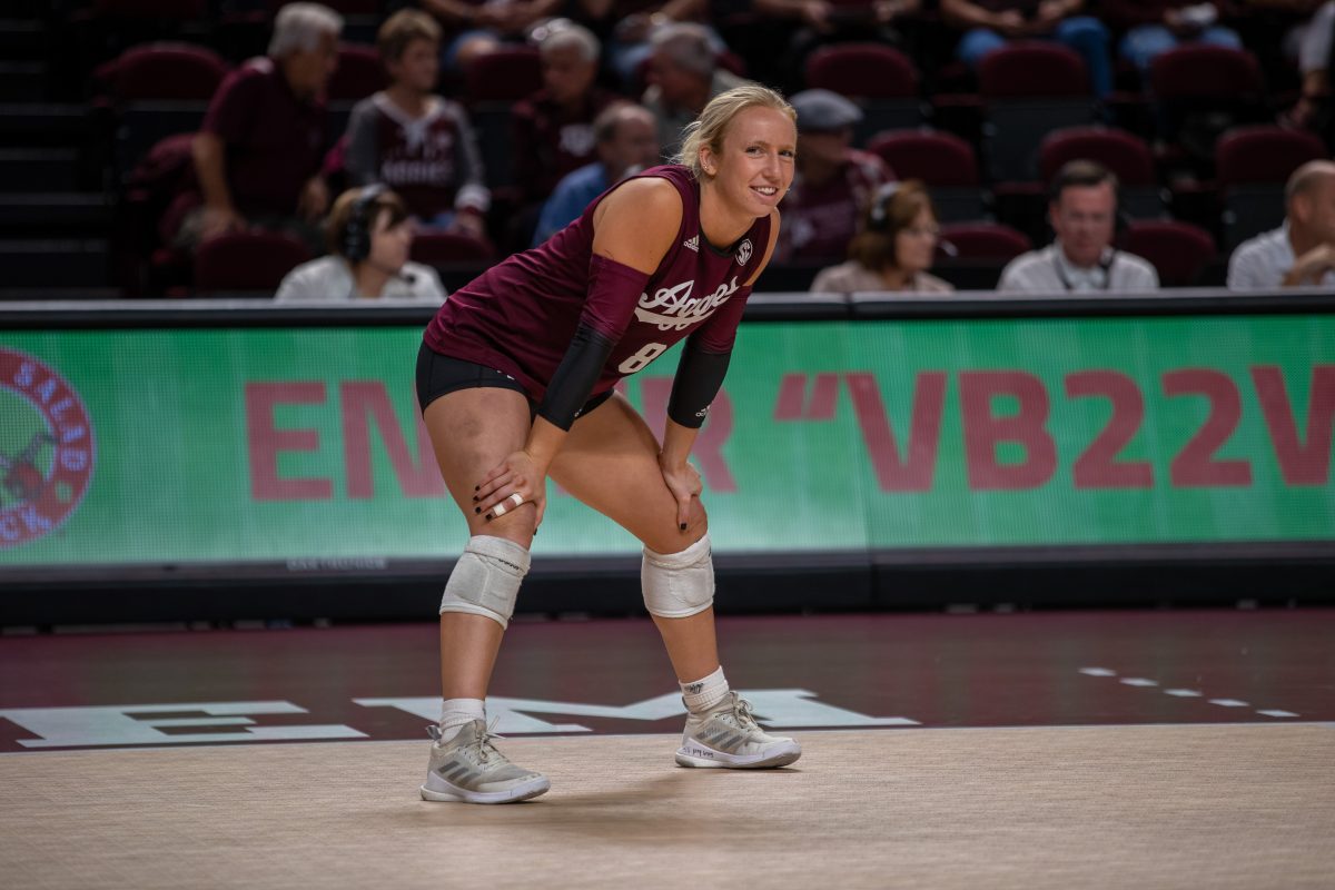 <p>Junior L/DS Lauren Hogan (8) is all smiles before A&M's match against Kentucky at Reed Arena on Sunday, Oct. 23, 2022.</p>