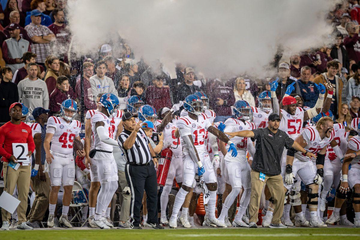 The Ole Miss team sets off a fire extinguisher on the sideline during Texas A&amp;M's game against Ole Miss at Kyle Field on Saturday, Oct. 29, 2022.