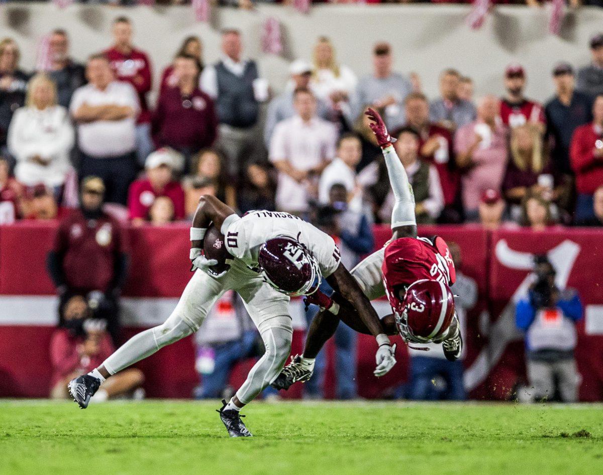 Freshman WR Chris Marshall pushes Alabama DB Terion Arnold (3) during a game against the Alabama Crimson Tide on Saturday, Oct. 8, 2022, at Bryant-Denny Stadium in Tuscaloosa, Alabama.