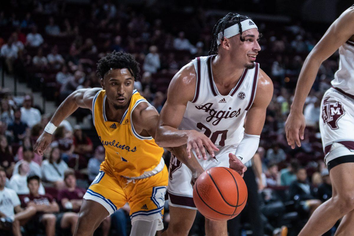 A&M Kingsvilles C.J. Smith (1) knocks the ball away from senior G Andre Gordon (20) during A&Ms game against A&M Kingsville at Reed Arena on Friday, Nov. 4, 2022. (Cameron Johnson/The Battalion)