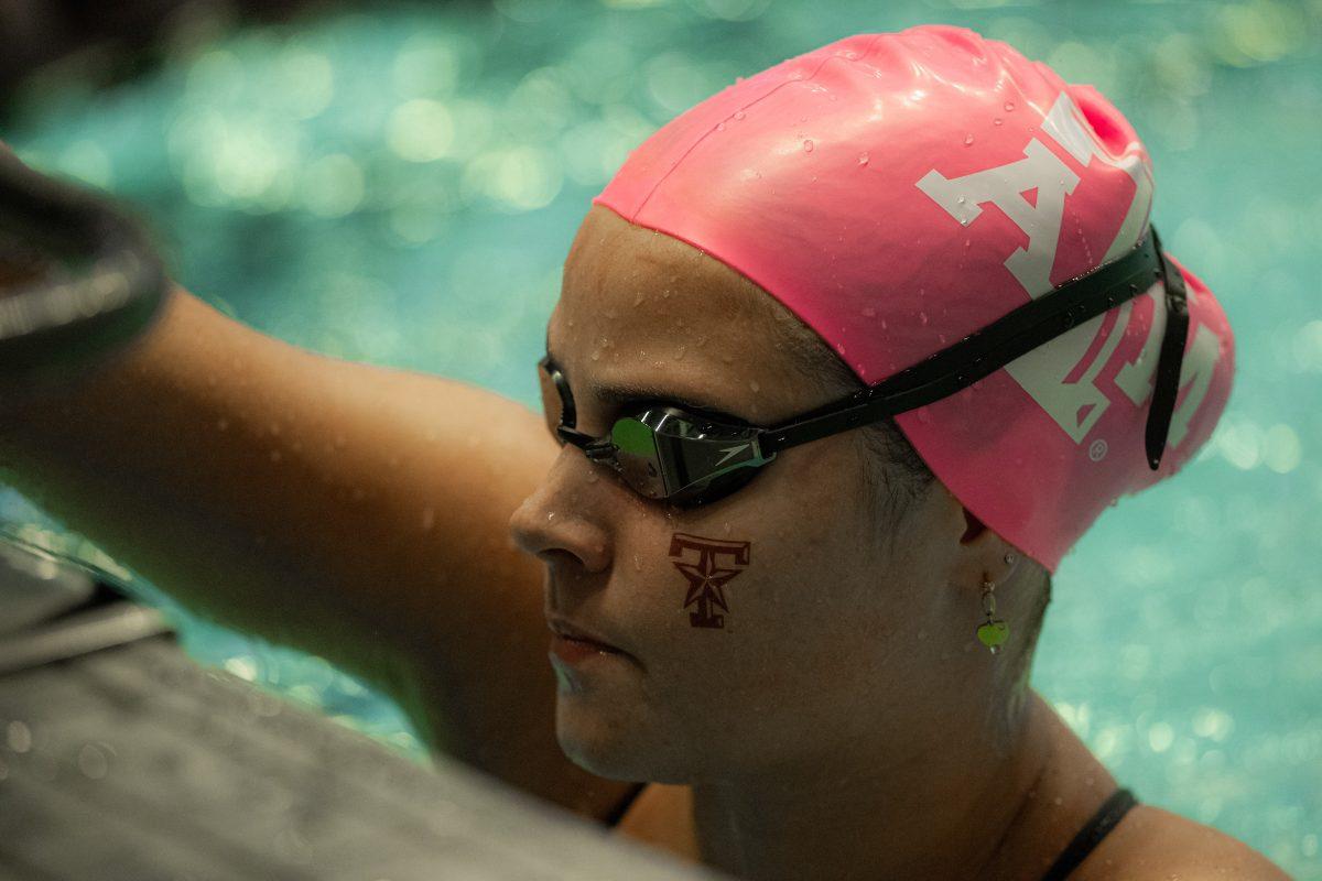 A&M swimmer prepares for backstroke during A&Ms meet against Houston at the Student Recreation Center Natatorium on Thursday, Oct. 6, 2022.