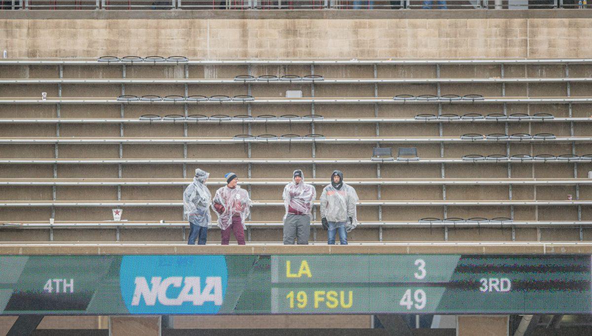 <p>The remainder of the crowd stand with ponchos during a game against UMass while The Aggies hope to break a 6-game losing streak on Saturday, Nov. 19 at Kyle Field (Ishika Samant/The Battalion)</p>