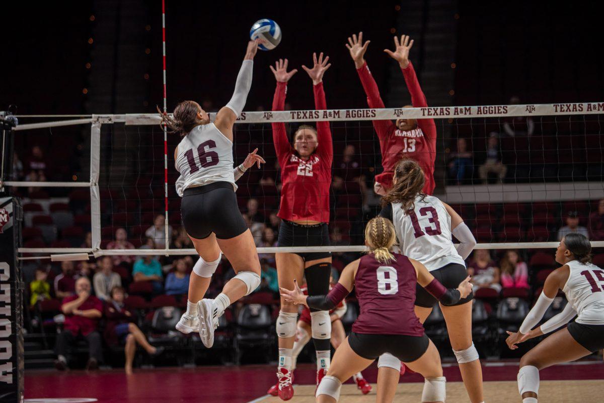 <p>Graduate OH Caroline Meuth (16) spikes the ball during A&M's match against Alabama at Reed Arena on Wednesday, Nov. 2, 2022.</p>