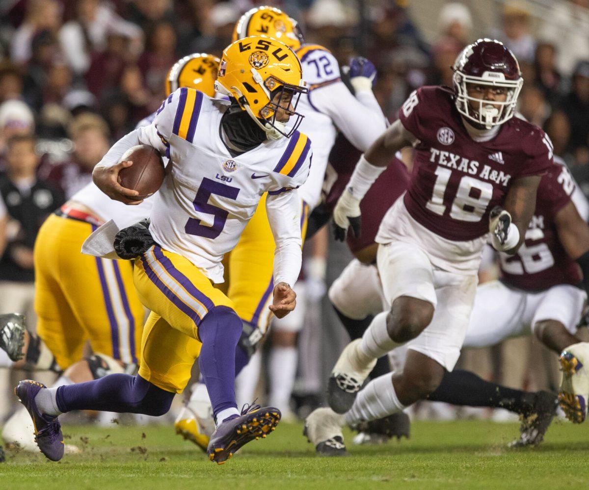LSU QB Jayden Daniels (5) runs with the ball during A&M's game against LSU at Kyle Field on Saturday, Nov. 26, 2022. (Cameron Johnson/The Battalion)