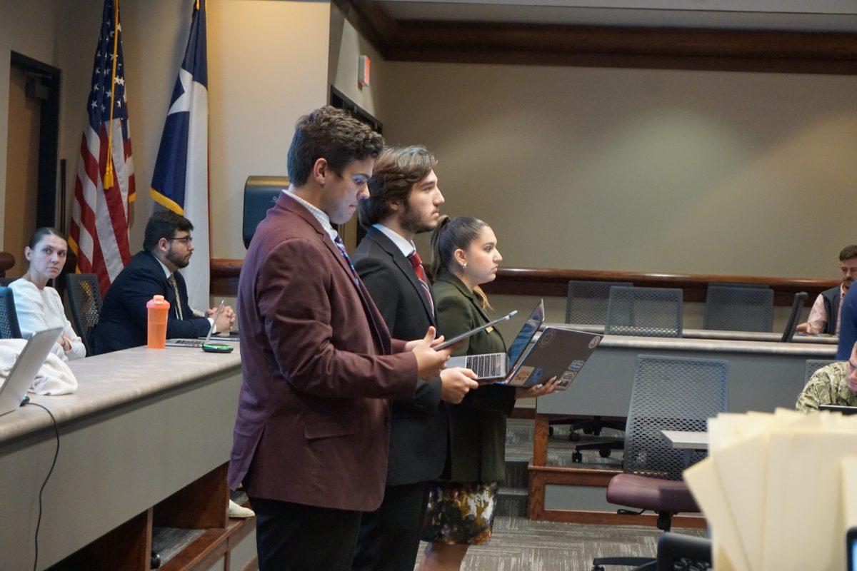 <p>Senators Cade Conrad, Connor Toon and Sydney Ramon address the Texas A&M Student Senate in the John J. Koldus Student Services Building on Wednesday, Nov. 2, 2022.</p>