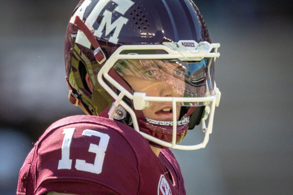 Sophomore QB Haynes King (13) signals to his wideout before signaling for the snap during the second half of Texas A&amp;M's game against Florida at Kyle Field on Saturday, Nov. 5, 2022.