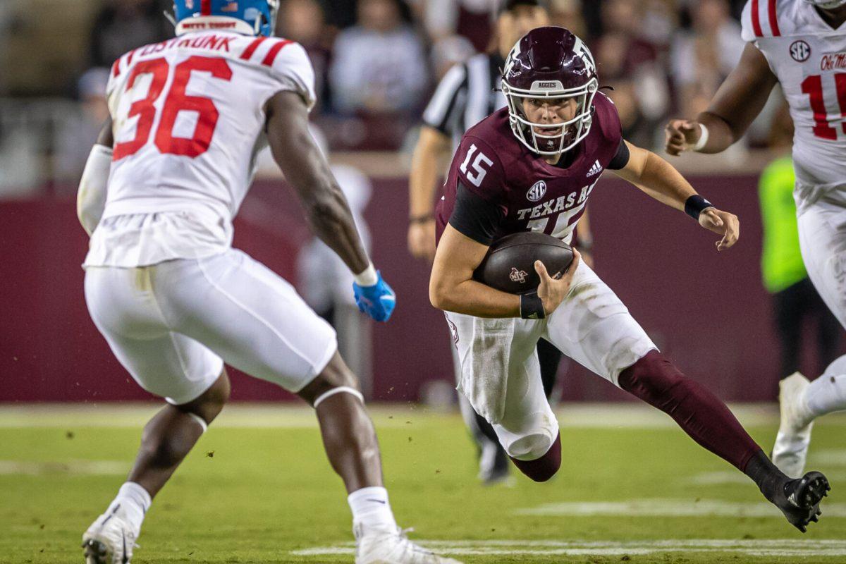 Freshman QB Conner Weigman (15) scrambles for a first down during Texas A&Ms game against Ole Miss at Kyle Field on Saturday, Oct. 29, 2022.