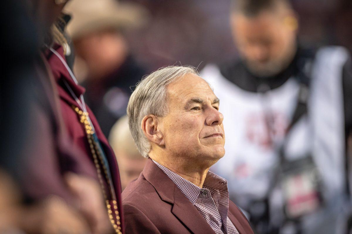 Texas Governor Greg Abbott on the sideline before the start of Texas A&amp;M's game against Ole Miss at Kyle Field on Saturday, Oct. 29, 2022.