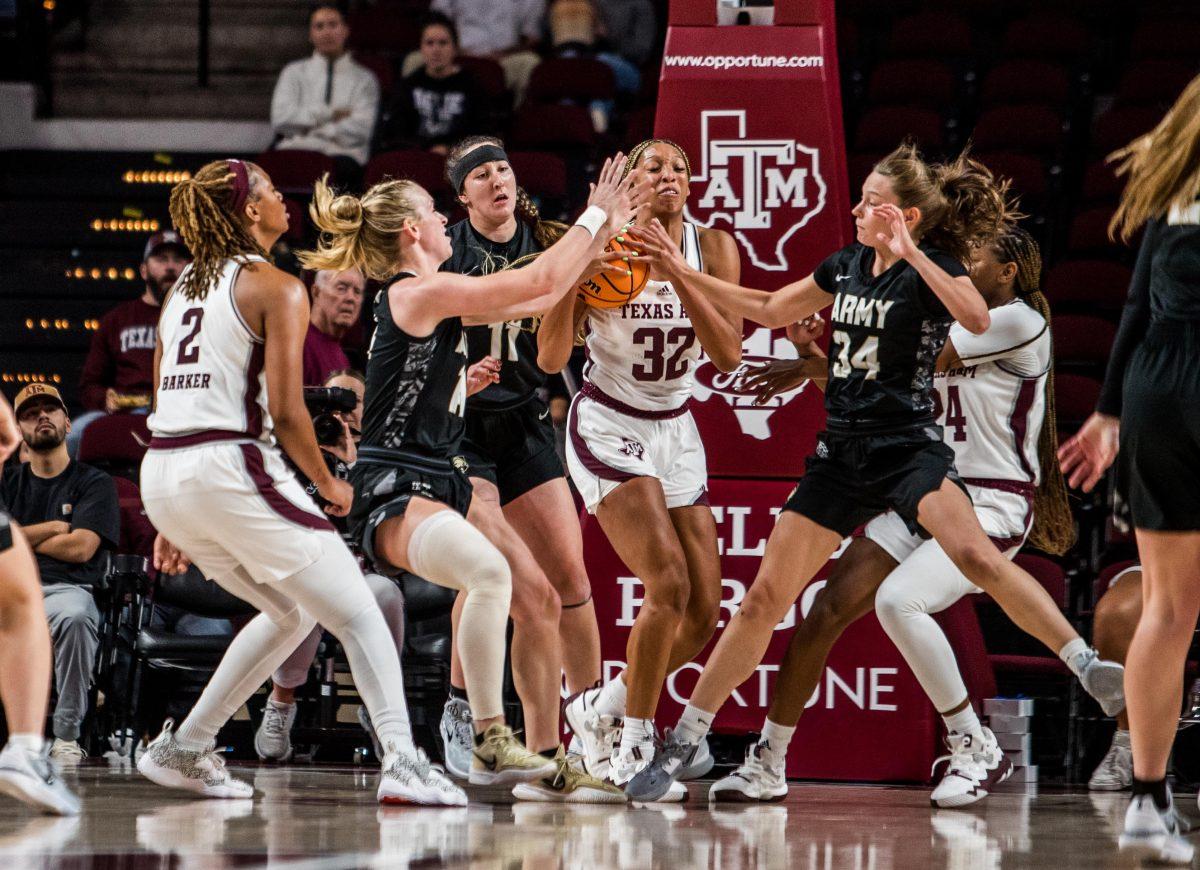 Graduate F Aaliyah Patty (32) catches a rebound during a game against Army at Reed Arena on Sunday, Nov. 13, 2022.
