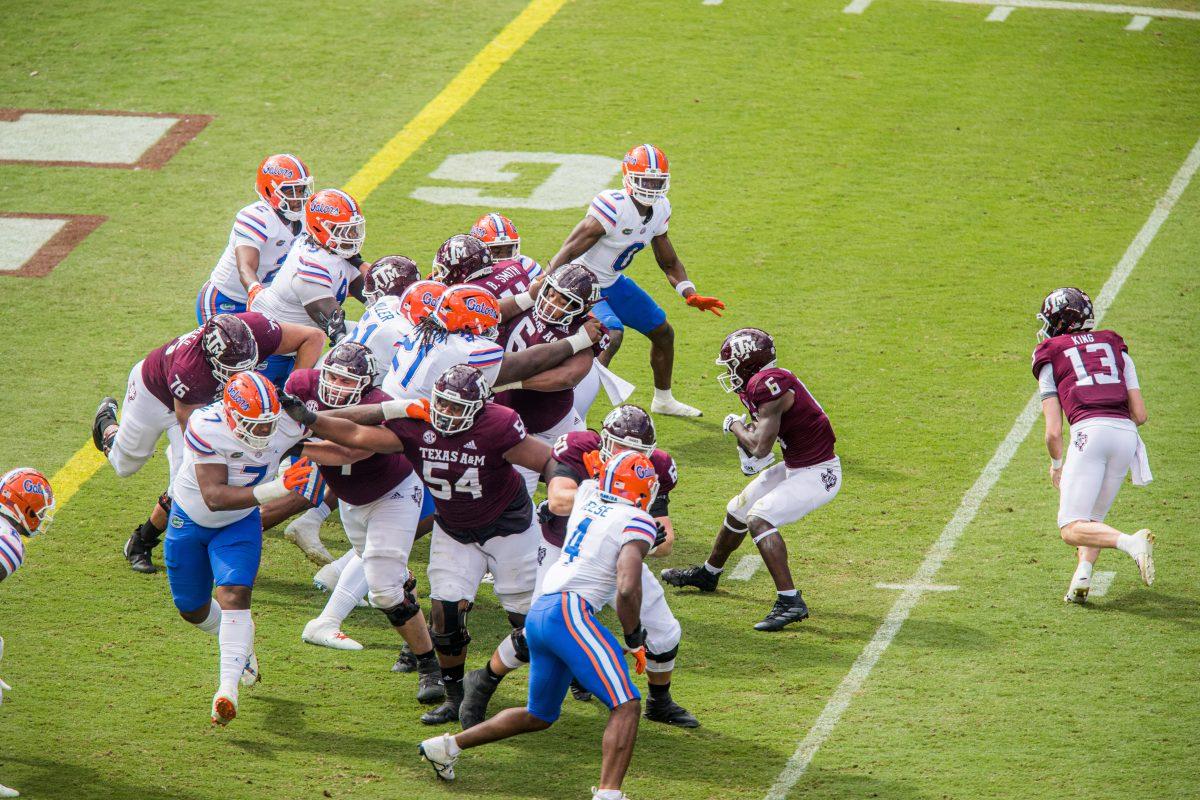 <p>Junior RB Devon Achane stops to see where to take the ball during a game against Florida on Saturday, Nov. 5, 2022 at Kyle Field</p>