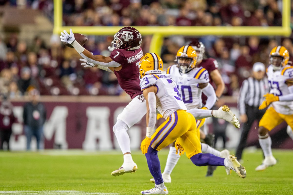 Sophomore WR Moose Muhammad III (7) catches a pass during A&amp;M's game at Kyle Field on Saturday, Nov. 26, 2022. (Jonathan Taffet/The Battalion)