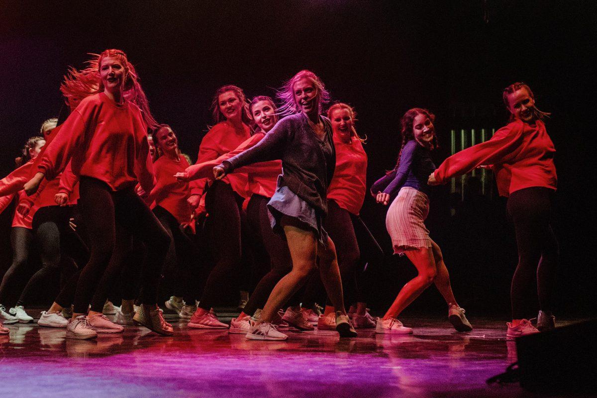 Theta+and+Bam+dancers+Laura+Kate+Schulze%2C+Lily+Byrd%2C+Addison+Lewis%2C+Campbell+Clark%2C+Erin+Demmers%2C+Kara+Coughran+and+Anna+Runquist+perform+at+the+2021+Songfest+in+the+Rudder+Theatre+Complex.