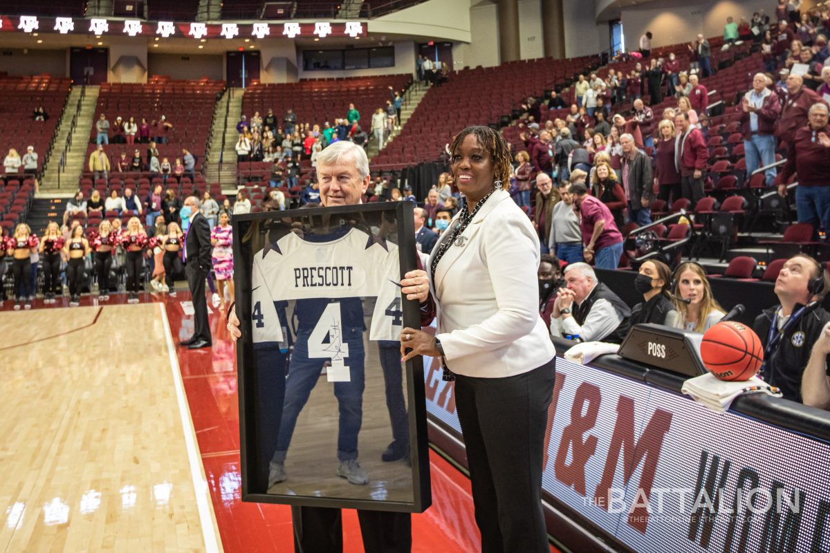 Auburn head coach Johnnie Harris presented A&M head coach Gary Blair with a signed Dak Prescott jersey as the Cowboys face the 49ers today in the NFC Wild Card.