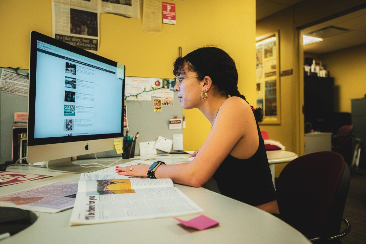 <p>Sports editor Zoe May works on the The Battalion website on Sunday, Jan. 22, 2023. </p>