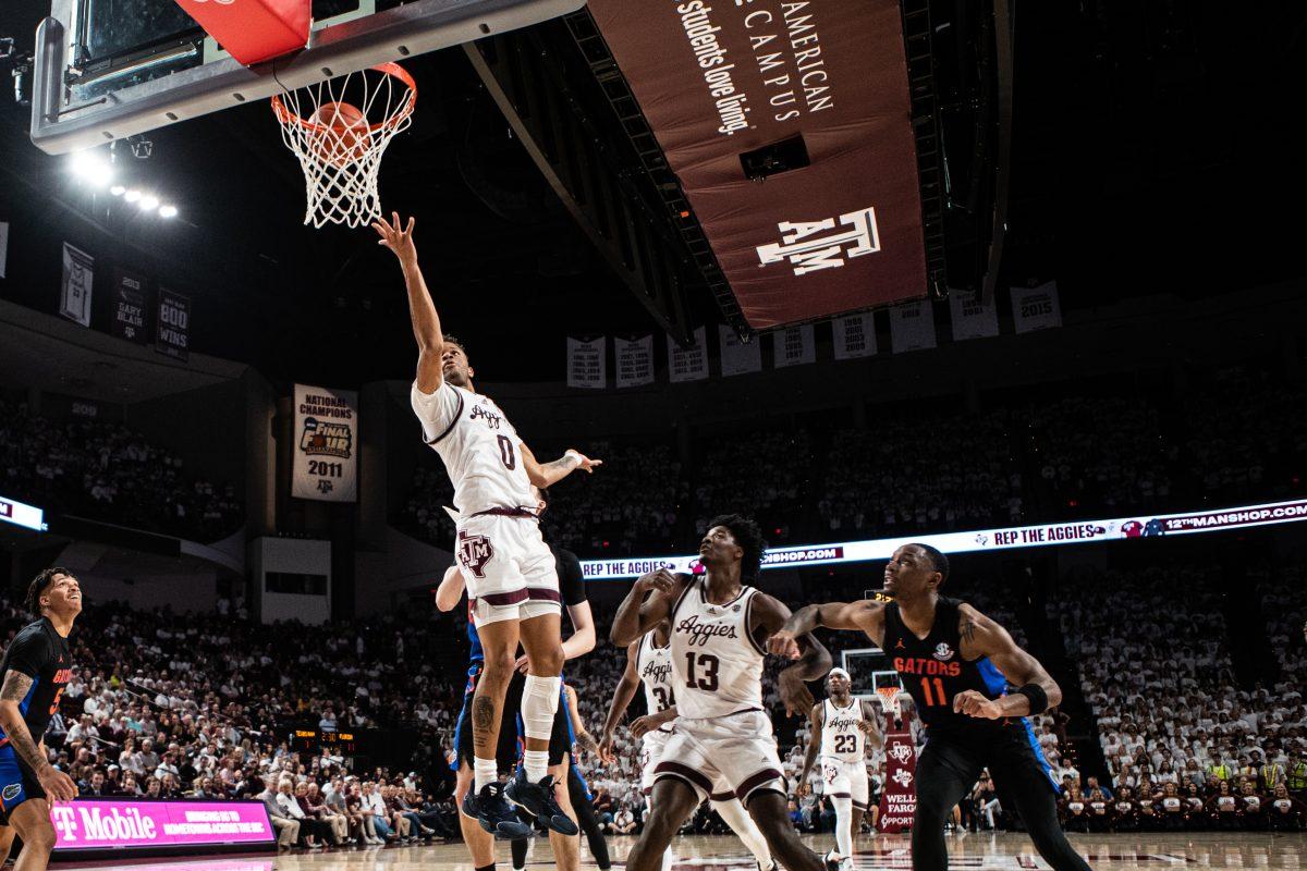 Graduate G Dexter Dennis (0) goes for a open layup at Reed Arena on Tuesday, Jan. 18, 2023