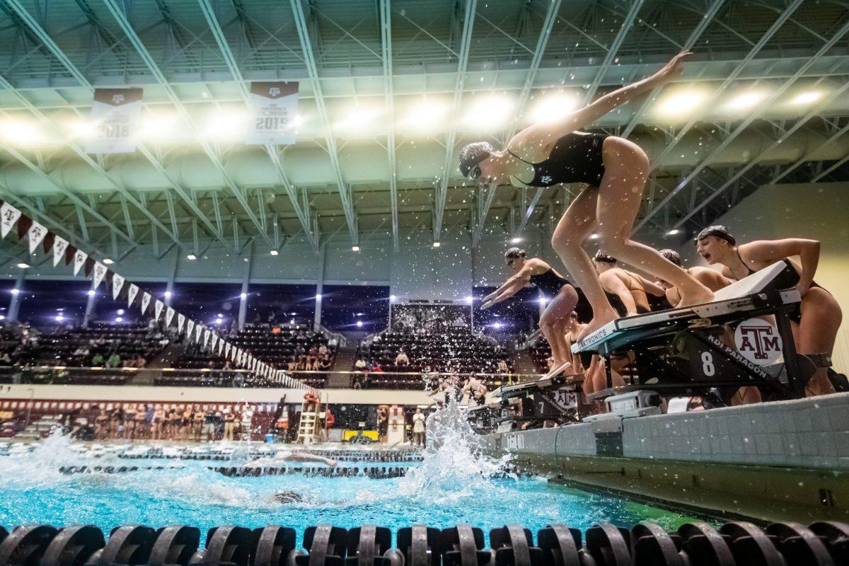 Freshman Lydia Palmer dives in as the final leg of Relay D in the 400 yard freestyle relay during Texas A&Ms meet against Rice at the Rec Center Natatorium on Saturday, Dec. 3, 2022.