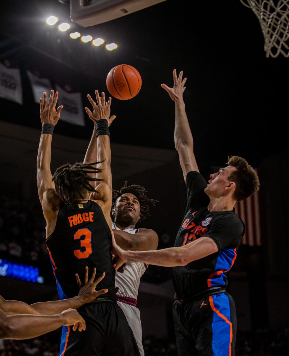 <p>Junior F Julius Marble (34) shoots a basket at Reed Arena on Wednesday, Jan. 23, 2023. (Ishika Samant/The Battalion) shoots a basket at Reed Arean on Wednesday, Jan. 18, 2023</p>