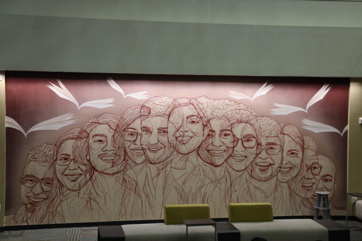 The mural drawn outside the Multicultural services office in the Memorial Student Center.