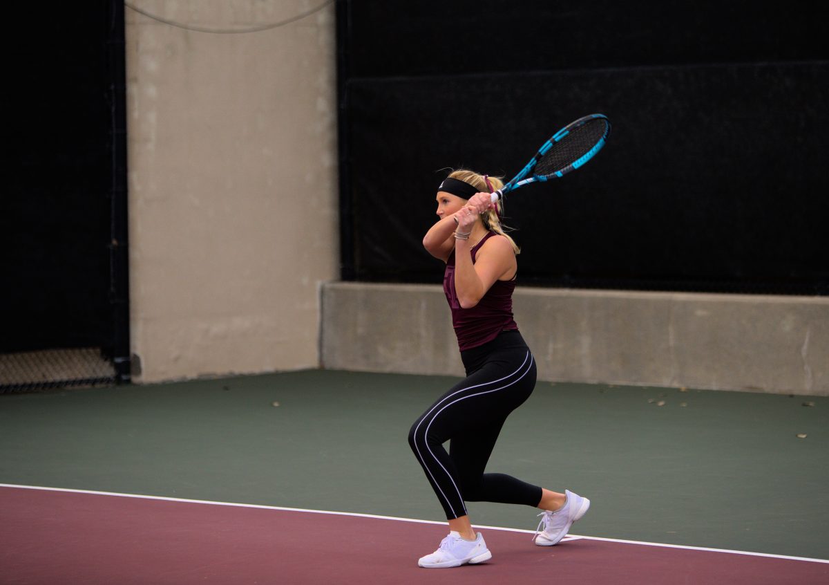 Graduate+Jayci+Goldsmith+after+volleying+the+ball+to+her+opponent%26%23160%3Bat%26%23160%3BMitchell+Outdoor+Tennis+Center%26%23160%3Bon+Friday%2C+Jan.+20%2C+2023.