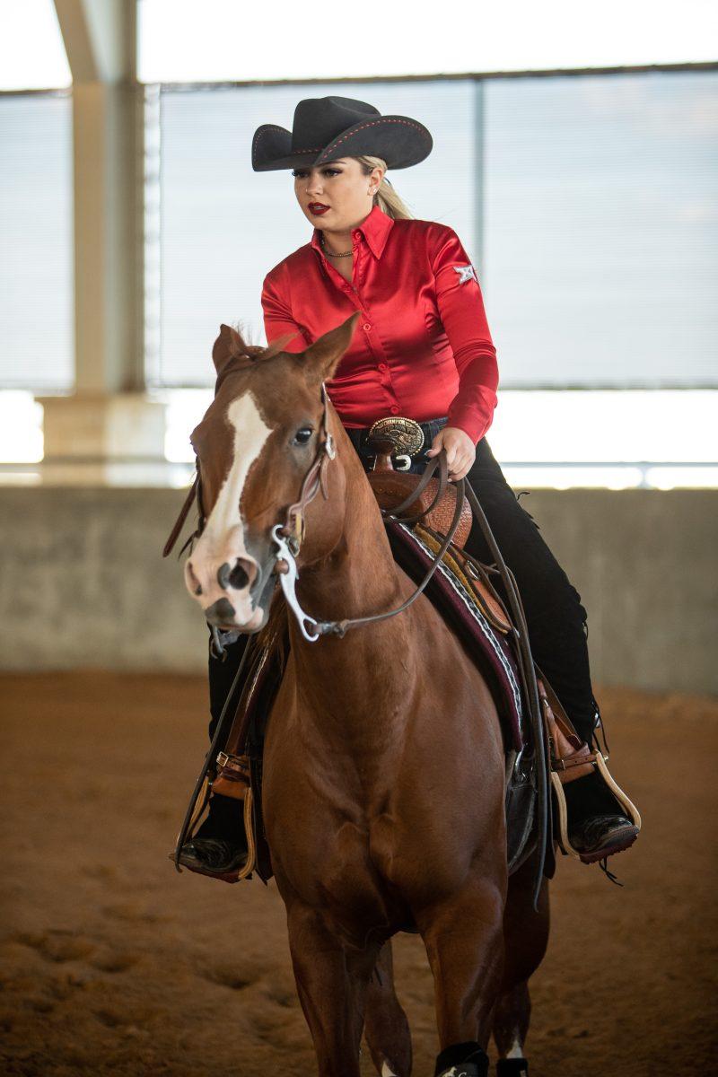 Junior Ashley Jackson rides A&amp;M's Indie in the reining event during the competition against Fresno State at Hildebrand Equine Complex on Thursday, Nov. 17, 2022.&#160;(Cameron Johnson/The Battalion)