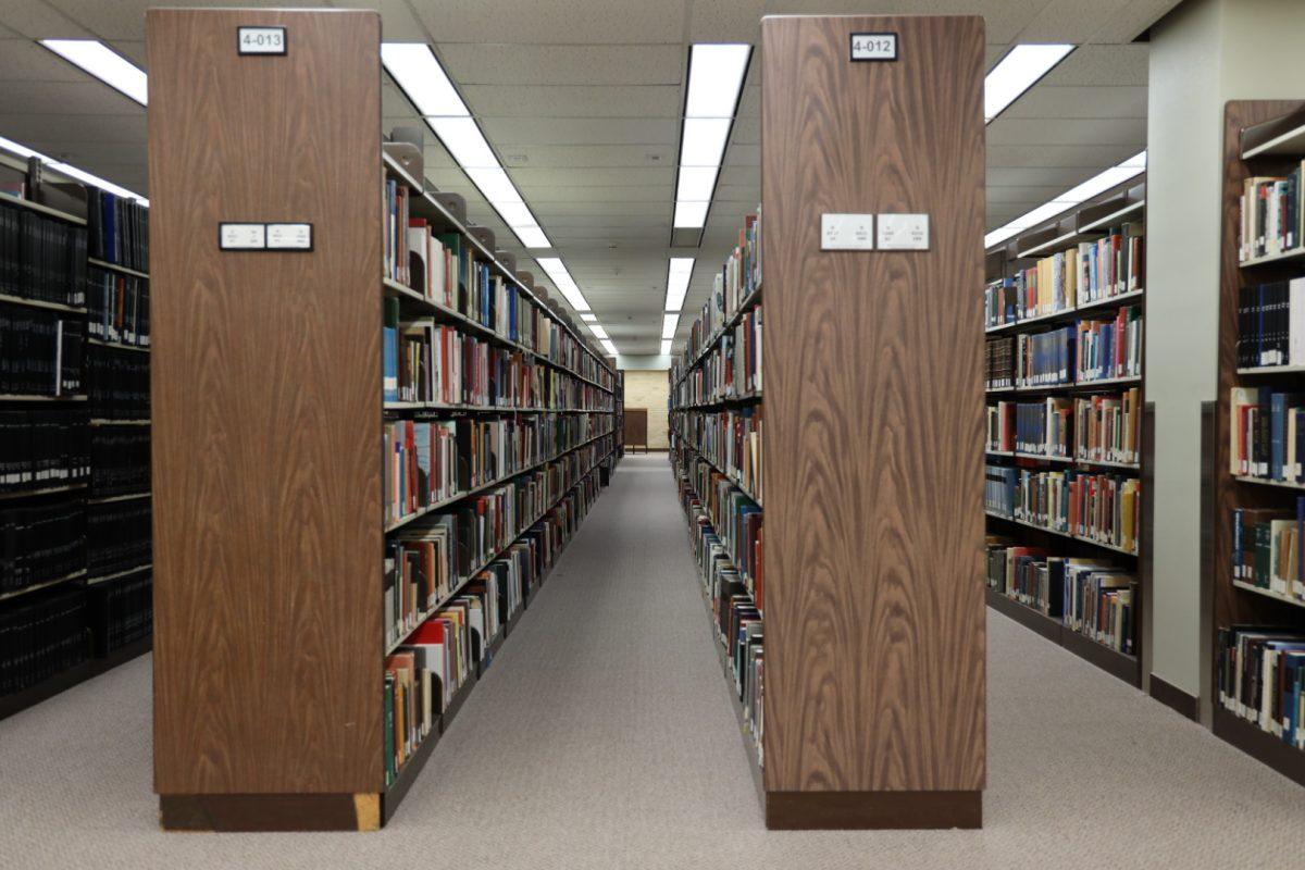 <p>Books line the shelves at Evans Library. </p>