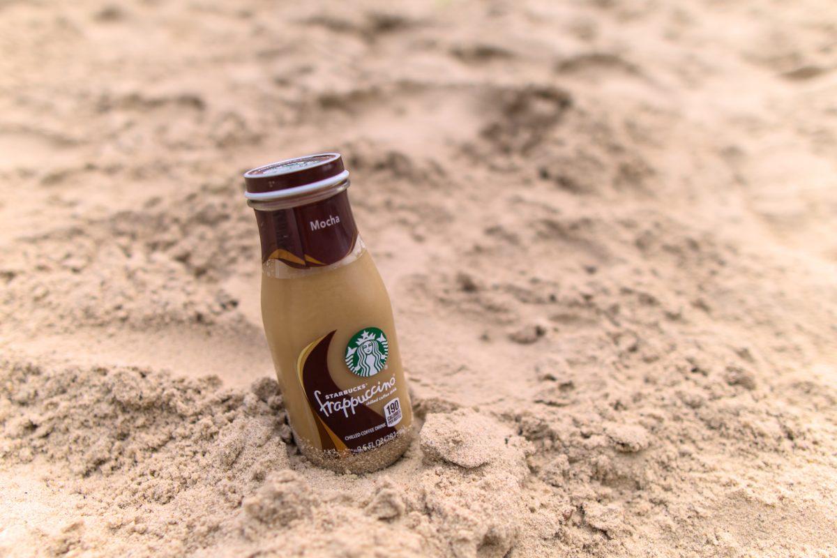 A Mocha Frappuccino from Starbucks in the sand on Sunday, Feb. 26, 2023.