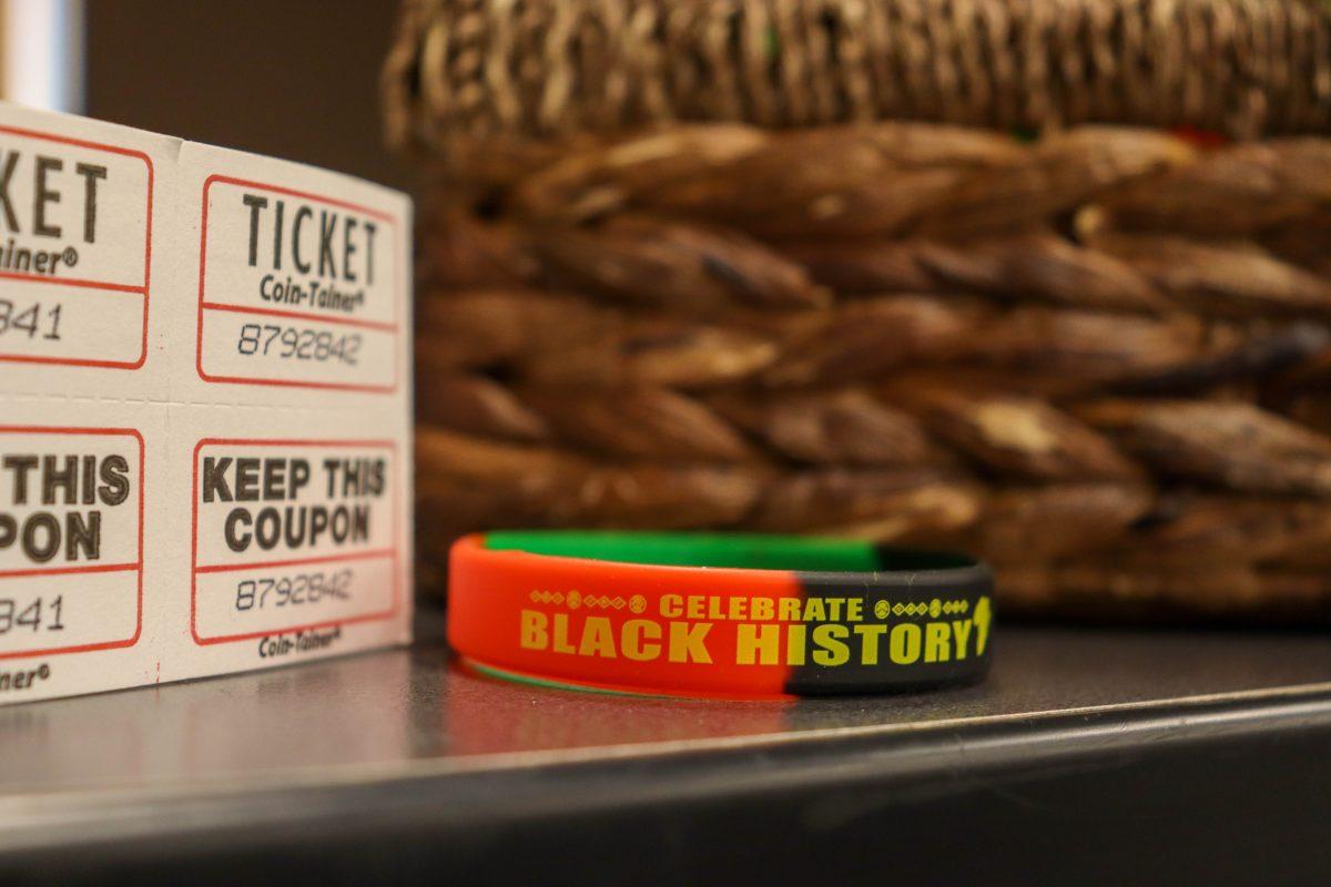 <p>'Celebrate Black History' wristbands at the West African Film Festival at Rudder Tower 701 on Thursday, Feb. 9, 2023</p>