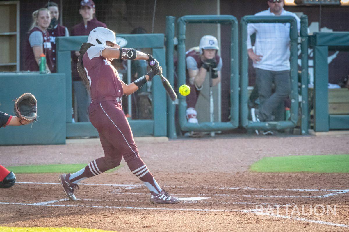 Senior OF Morgan Smith (23) hits a ball during the bottom of the third inning in Davis Diamond on Wednesday, April 27, 2022.