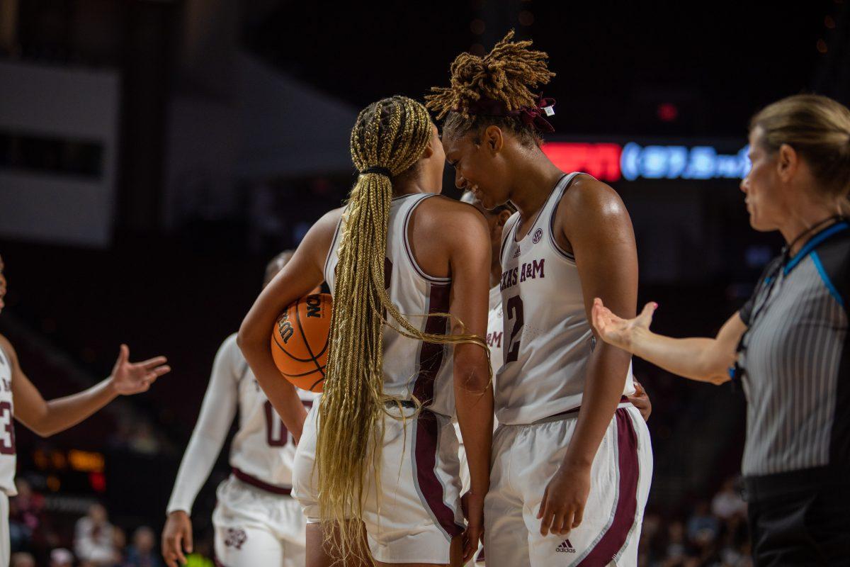 <p>Freshman F Janiah Barker (2) and Graduate F Aaliyah Patty (32) laugh during a break during A&M's game against Texas A&M-Corpus Christi at Reed Arena on Thursday, Nov. 10, 2022.</p>