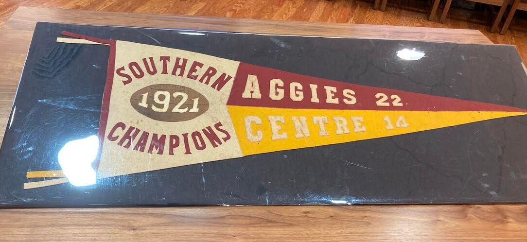 A pennant on display for Aggieland Saturday in Cushing Memorial Library on Saturday, Feb. 11, 2023. 