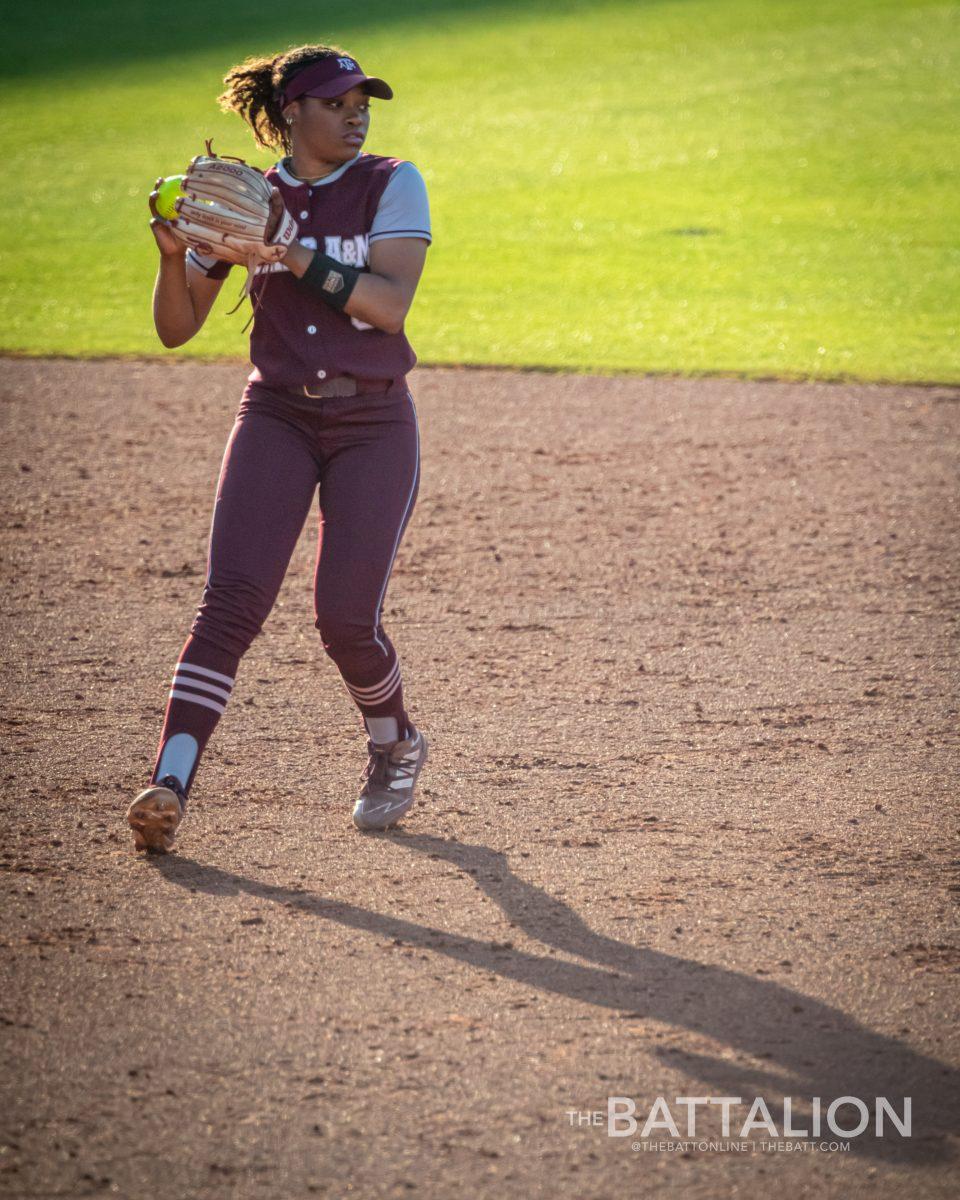 Freshman IF Koko Wooley (3) throws to second to earn the Aggies second out of the top third inning in Davis Diamond on Wednesday, April 27, 2022.