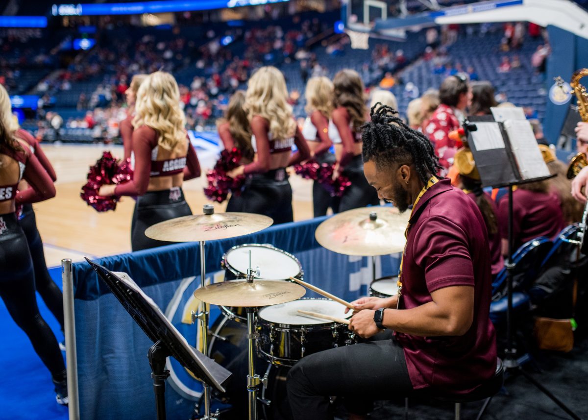 <p>Mechanical engineering senior Derrion Elder plays the drums</p>