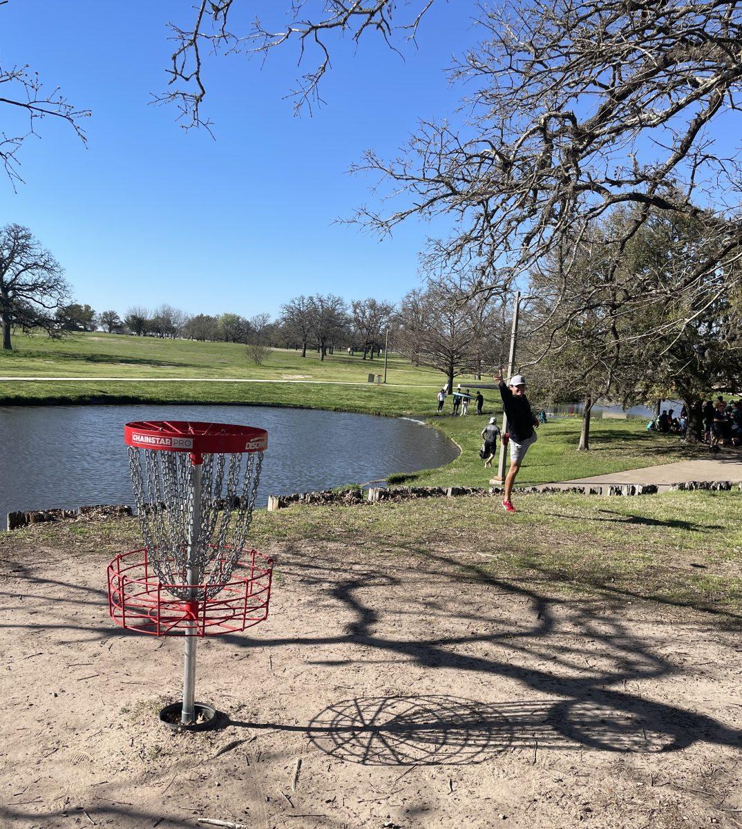 Mixed Amateur 2 Division champion Diego Avila putts Hole 1 at Research Park On March 4 during the BTHO Bogeys fundraiser.&#160;&#160;