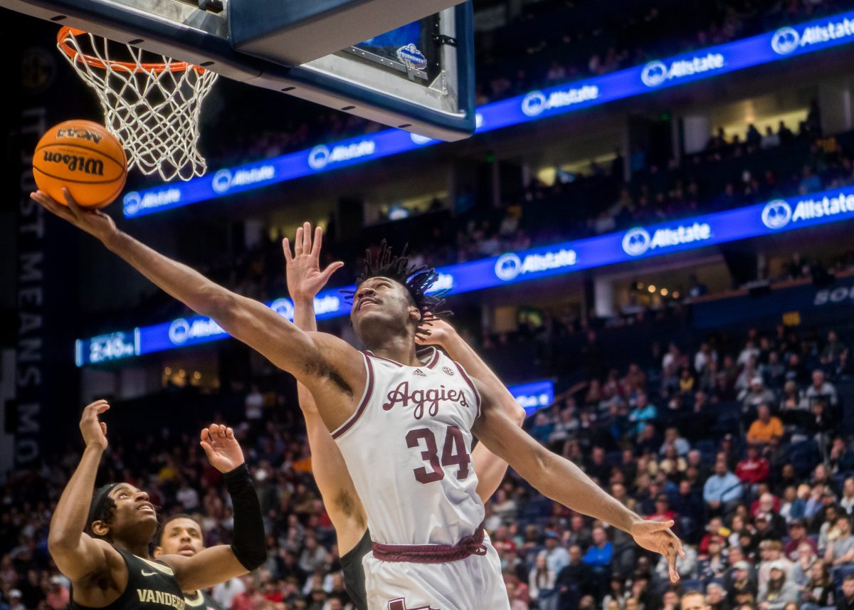 <p>Junior F Julius Marble (34) shoots a basket during a game vs. Vanderbilt on Saturday, March 11, 2023 in Bridgestone Arena, Nashville, Tennessee.</p>