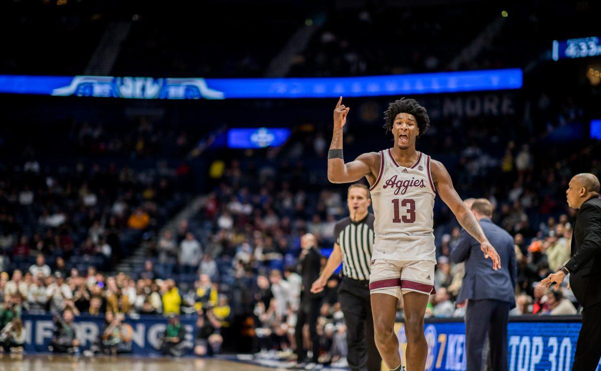 Freshman F Solomon Washington (13) asks the refs to replay the last foul-play during a game vs. Vanderbilt on Saturday, March 11, 2023 in Bridgestone Arena, Nashville, Tennessee.