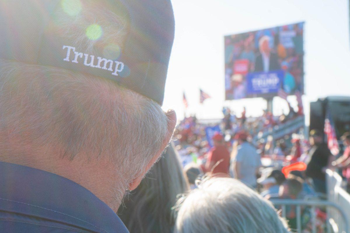 A man wearing a Trump hat during a rally in Waco, Texas. 