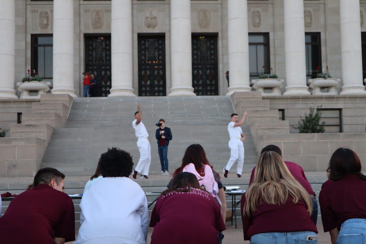 The Yell leaders at Legacy Night outside the admin building in 2022. 