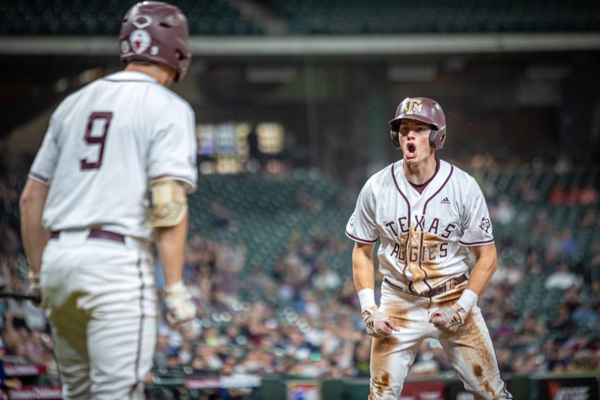 Sophomore CF Tab Tracy (47) celebrates after scoring during Texas A&Ms game against Rice at Minute Maid Park in Houston, Texas, on Saturday, March 4, 2023.