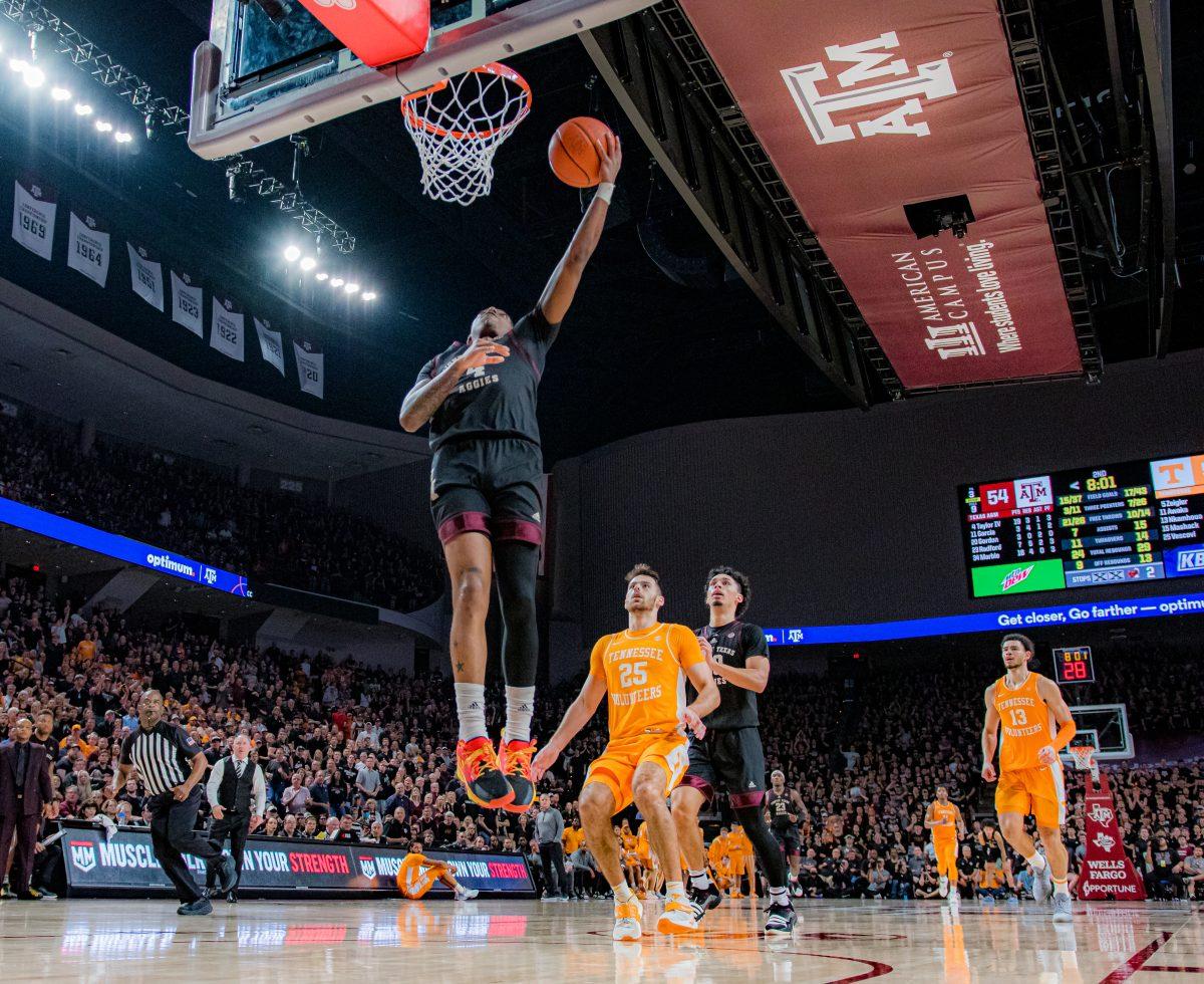 Sophomore G Wade Taylor (4) shoots a basket during a game vs. Tennessee at Reed Arena on Tuesday, Feb. 21, 2023.