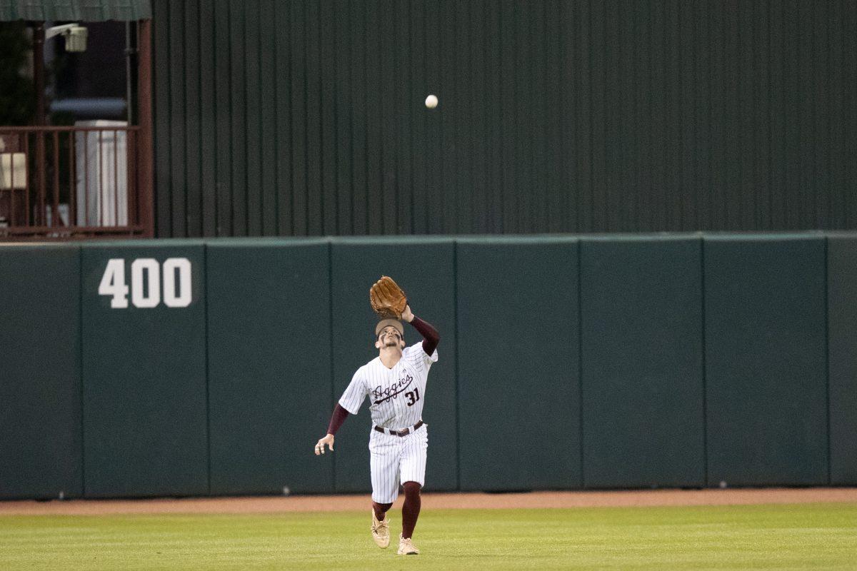 Senior+OF+Jordan+Thompson+%2831%29+puts+his+glove+up+to+catch+the+baseball+at+Olsen+Field+on+Friday%2C+March+17%2C+2023.