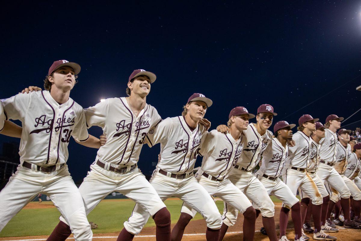 Texas A&M baseball players do the war hymn after winning over Prairie View A&M at Olsen Field on Wednesday, April 19, 2023.