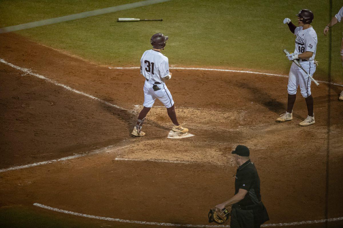 Senior CF Jordan Thompson (31) crosses home plate after hitting a home run during Texas A&amp;M's game against Mizzou at Olsen Field on Thursday, April 13, 2023.