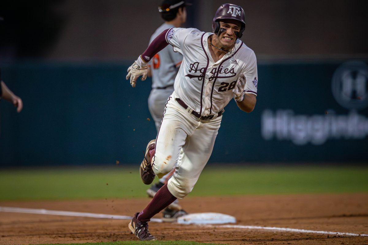 Junior 3B Trevor Werner (28) runs towards home plate after freshman LF Jace LaViolette (17) hit a double to left center during Texas A&Ms game against Sam Houston State at Olsen Field on Tuesday, April 25, 2023.